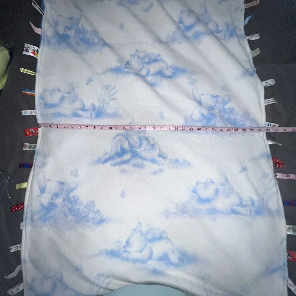 Winnie The Pooh And Friends Baby Blanket With Soothing Tabs Blue Size 31 X 49‎